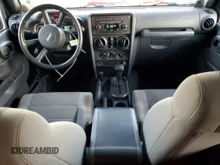 2007 Jeep Wrangler Unlimited Sahara with VIN 1J8GA59117L188579, listed as a Copart auction lot 79823624 with 68,322 mi miles and Clean Title. Bid and sale history available at carsss.com. Image 8.