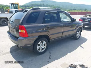 2005 Kia Sportage LX with VIN KNDJE723957075445, listed as a IAAI auction lot 42573760 with 185,000 mi miles and . Bid and sale history available at DreamBid. Image 4.