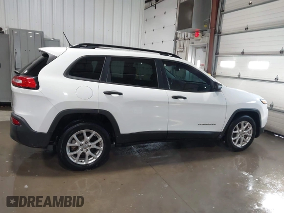2016 Jeep Cherokee Sport z VIN 1C4PJLAB2GW291282, wystawiony jako IAAI lot #41579554 z przebiegiem 121 590 mil mil oraz . Historia ofert i sprzedaży dostępna na DreamBid. Obrazek 13.