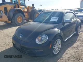 2013 Volkswagen Beetle 2.5L with VIN 3VWJP7AT1DM608370, listed as a IAAI auction lot 42088900 with Not Provided miles and . Bid and sale history available at DreamBid. Image 18.