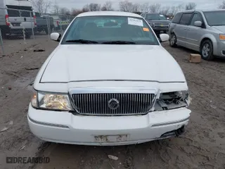 2004 Mercury Grand Marquis GS with VIN 2MEFM74W24X628573, listed as a IAAI auction lot 41922123 with 104,395 mi miles. Bid and sale history available at carsss.com. Image 12.