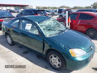 2001 Honda Civic LX with VIN 1HGEM21551L111533, listed as a IAAI auction lot 41801139 with 253,497 mi miles. Bid and sale history available at carsss.com. Image 6.