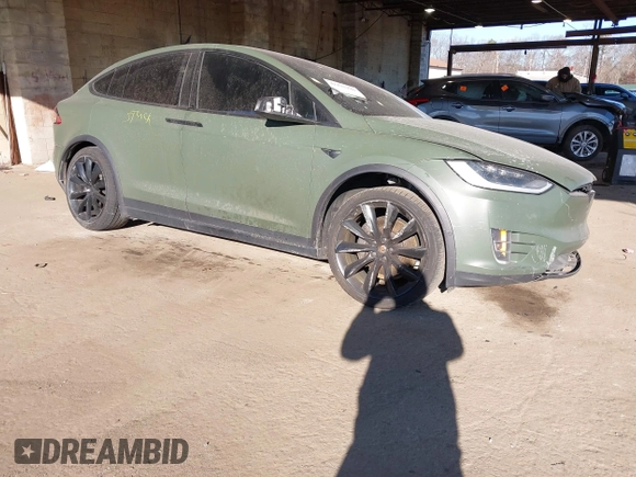 2020 Tesla Model X Long Range with VIN 5YJXCDE24LF272242, listed as a IAAI auction lot 41275226 with 103,731 mi miles. Bid and sale history available at carsss.com. Image 1.