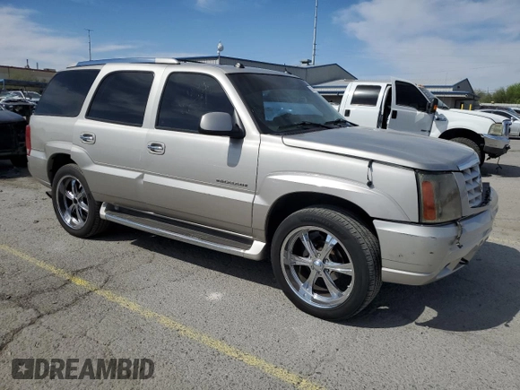 2004 Cadillac Escalade z VIN 1GYEC63T44R235759, wystawiony jako Copart lot #53166755 z przebiegiem 212 034 mil mil oraz Szkody całkowita. Historia ofert i sprzedaży dostępna na DreamBid. Obrazek 4.