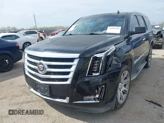 2015 Cadillac Escalade Luxury z VIN 1GYS4BKJ2FR260848, wystawiony jako IAAI lot #41895938 z przebiegiem 157 531 mil mil oraz . Historia ofert i sprzedaży dostępna na DreamBid. Obrazek 2.