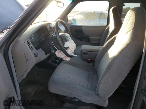 1999 Mazda B-Series 2WD Truck SE with VIN 4F4YR16V6XTM13090, listed as a Copart auction lot 88598745 with 202,722 mi miles and Salvage Title. Bid and sale history available at carsss.com. Image 7.