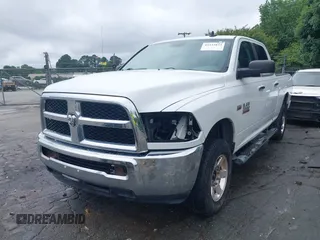 2013 Ram 2500 SLT z VIN 3C6TR5DT7DG524758, wystawiony jako IAAI lot #42333873 z przebiegiem Nie podano mil oraz . Historia ofert i sprzedaży dostępna na DreamBid. Obrazek 19.