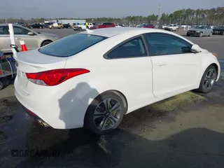 2013 Hyundai Elantra Coupe SE with VIN KMHDH6AE3DU010717, listed as a IAAI auction lot 41832406 with 232,929 mi miles. Bid and sale history available at carsss.com. Image 4.