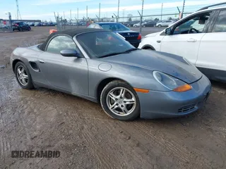 2002 Porsche Boxster z VIN WP0CA29892U625393, wystawiony jako IAAI lot #41519494 z przebiegiem 127 790 mil mil oraz . Historia ofert i sprzedaży dostępna na DreamBid. Obrazek 1.