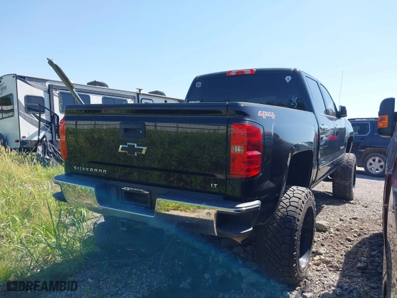 2016 Chevrolet Silverado 1500 LT with VIN 3GCUKREC3GG231290, listed as a IAAI auction lot 40113464 with 160,109 mi miles. Bid and sale history available at carsss.com. Image 4.