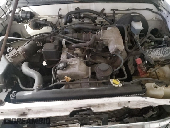2002 Toyota Tacoma with VIN 5TEVL52N52Z132628, listed as a Copart auction lot 44796245 with 209,480 mi miles and Salvage title. Bid and sale history available at DreamBid. Image 11.