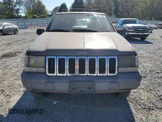 1998 Jeep Grand Cherokee Laredo with VIN 1J4GZ58S5WC165213, listed as a Copart auction lot 77611434 with 168,688 mi miles and Salvage Title. Bid and sale history available at carsss.com. Image 5.