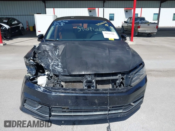 2019 Volkswagen Passat 2.0T Wolfsburg Edition with VIN 1VWLA7A30KC009646, listed as a IAAI auction lot 39842320 with 101,006 mi miles. Bid and sale history available at carsss.com. Image 13.