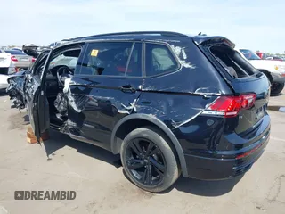2023 Volkswagen Tiguan SE R-Line Black с VIN 3VVCB7AX9PM014564, выставлен на аукционе IAAI как лот 41993740 с пробегом Не указан миль и . История ставок и продаж доступна на DreamBid. Изображение 3.