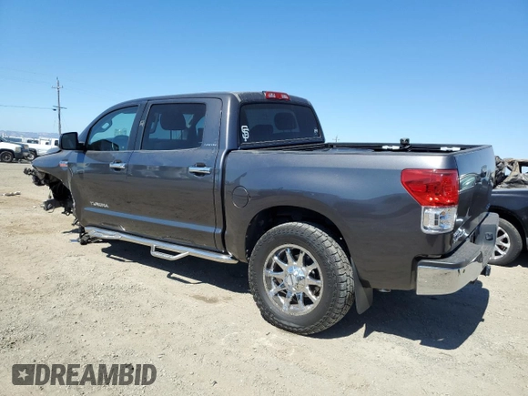 2012 Toyota Tundra 4WD Truck LTD with VIN 5TFHY5F13CX220317, listed as a Copart auction lot 73597184 with 127,307 mi miles and Salvage Title. Bid and sale history available at carsss.com. Image 2.