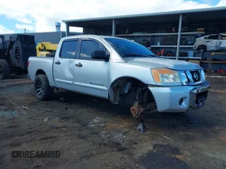 2008 Nissan Titan XE with VIN 1N6AA07DX8N351455, listed as a IAAI auction lot 41626233 with 173,182 mi miles. Bid and sale history available at carsss.com. Image 1.