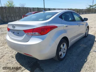 2013 Hyundai Elantra GLS PZEV with VIN KMHDH4AE3DU731897, listed as a IAAI auction lot 42061100 with 78,194 mi miles. Bid and sale history available at carsss.com. Image 4.