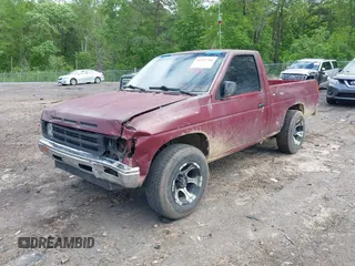 1991 Nissan Frontier z VIN 1N6SD11S0MC387024, wystawiony jako IAAI lot #41972766 z przebiegiem 123 649 mil mil oraz . Historia ofert i sprzedaży dostępna na DreamBid. Obrazek 2.