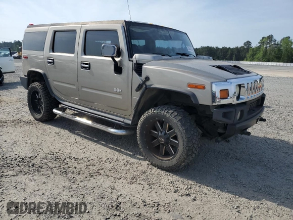 2004 Hummer H2 with VIN 5GRGN23U74H117378, listed as a Copart auction lot 53054185 with 117,378 mi miles and Clean Title. Bid and sale history available at carsss.com. Image 4.