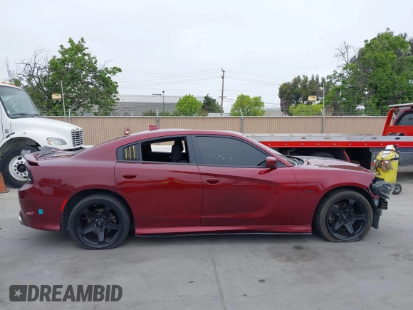 2019 Dodge Charger R/T with VIN 2C3CDXCT2KH749207, listed as a IAAI auction lot 42120658 with 52,330 mi miles and . Bid and sale history available at carsss.com. Image 13.