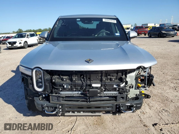 2023 Rivian R1T Adventure with VIN 7FCTGAAA3PN020577, listed as a Copart auction lot 84847414 with 7,888 mi miles and Salvage Title. Bid and sale history available at carsss.com. Image 5.