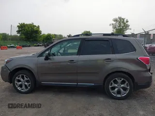 2017 Subaru Forester Touring z VIN JF2SJAWC6HH529707, wystawiony jako IAAI lot #42401138 z przebiegiem 172 868 mil mil oraz . Historia ofert i sprzedaży dostępna na DreamBid. Obrazek 14.