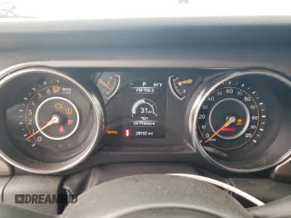 2022 Jeep Wrangler Sport S with VIN 1C4GJXAG2NW173555, listed as a Copart auction lot 87008354 with 28,932 mi miles and Salvage title. Bid and sale history available at DreamBid. Image 9.