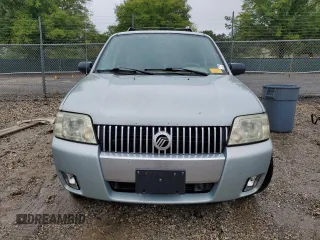 2005 Mercury Mariner Luxury z VIN 4M2CU56185DJ12005, wystawiony jako Copart lot #73570914 z przebiegiem 185 354 mil mil oraz Tytuł czysty. Historia ofert i sprzedaży dostępna na DreamBid. Obrazek 5.