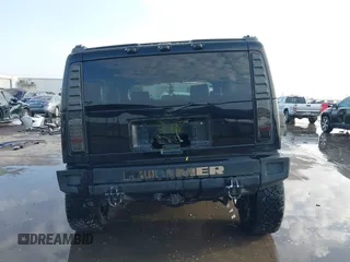 2003 Hummer H2 z VIN 5GRGN23UX3H112173, wystawiony jako IAAI lot #41093359 z przebiegiem Nie podano mil oraz . Historia ofert i sprzedaży dostępna na DreamBid. Obrazek 17.