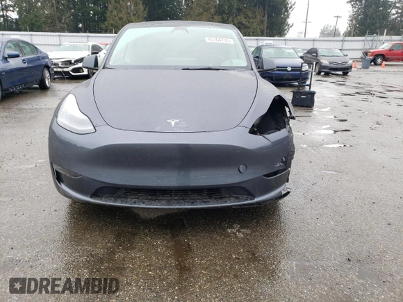 2022 Tesla Model Y Performance with VIN 7SAYGDEF2NF459268, listed as a Copart auction lot 45764735 with 64,421 mi miles and Salvage title. Bid and sale history available at DreamBid. Image 5.