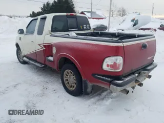 1998 Ford F-150 XL with VIN 2FTRX08L2WCA75995, listed as a Copart auction lot 43717305 with 301,987 mi miles and Salvage title. Bid and sale history available at DreamBid. Image 2.