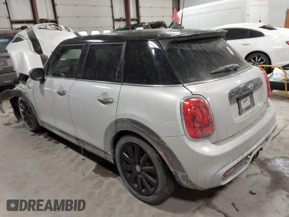 2015 MINI Hardtop 4 Door S with VIN WMWXU3C56F2B66449, listed as a IAAI auction lot 41296784 with 53,589 mi miles and . Bid and sale history available at DreamBid. Image 3.