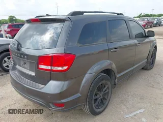 2019 Dodge Journey SE with VIN 3C4PDCBBXKT860142, listed as a IAAI auction lot 42126997 with 101,675 mi miles and . Bid and sale history available at DreamBid. Image 4.
