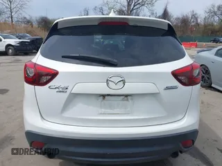 2016 Mazda CX-5 Grand Touring with VIN JM3KE4DY6G0618121, listed as a IAAI auction lot 41958805 with 101,232 mi miles. Bid and sale history available at carsss.com. Image 17.