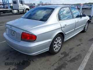 2003 Hyundai Sonata GLS with VIN KMHWF35H23A909117, listed as a IAAI auction lot 41535679 with 149,285 mi miles. Bid and sale history available at carsss.com. Image 4.