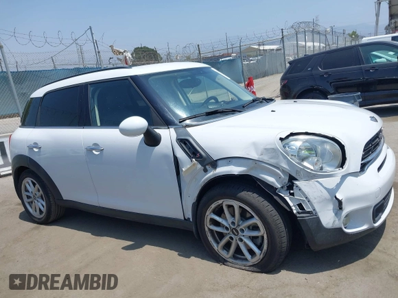 2016 MINI Countryman S with VIN WMWZC3C51GWT10248, listed as a IAAI auction lot 42359191 with 77,157 mi miles and . Bid and sale history available at DreamBid. Image 13.