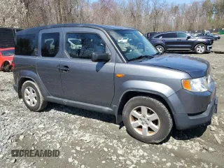 2010 Honda Element EX with VIN 5J6YH2H72AL005123, listed as a Copart auction lot 50206125 with 200,077 mi miles and Salvage Title. Bid and sale history available at DreamBid. Image 4.