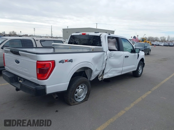 2021 Ford F-150 XL with VIN 1FTFW1E57MKE46739, listed as a IAAI auction lot 41823454 with 60,202 mi miles and . Bid and sale history available at DreamBid. Image 4.