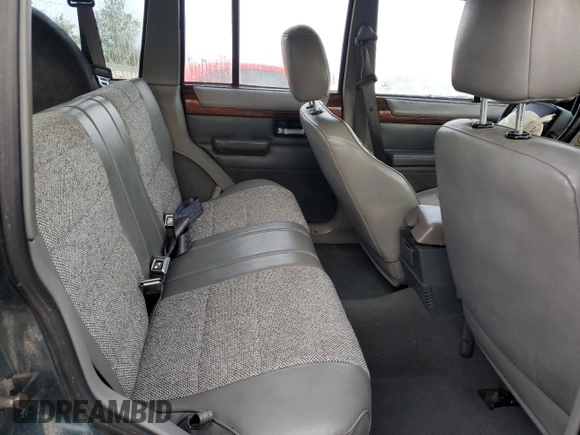 1996 Jeep Cherokee Country with VIN 1J4FJ78S7TL242853, listed as a Copart auction lot 73022554 with 84,868 mi miles and Salvage Title. Bid and sale history available at carsss.com. Image 11.