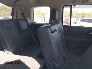 2013 Honda Pilot Touring with VIN 5FNYF4H97DB069979, listed as a IAAI auction lot 42133922 with 276,574 mi miles and . Bid and sale history available at carsss.com. Image 8.