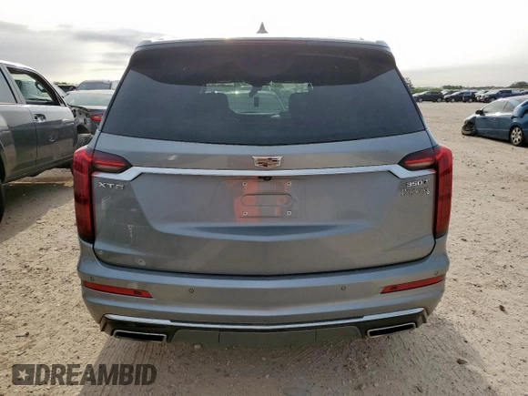 2024 Cadillac XT6 FWD Luxury with VIN 1GYKPAR41RZ700452, listed as a Copart auction lot 57675945 with 27,449 mi miles and Salvage title. Bid and sale history available at DreamBid. Image 6.