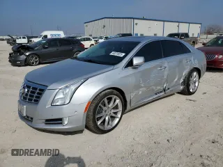 2014 Cadillac XTS Premium with VIN 2G61P5S34E9308986, listed as a Copart auction lot 44074925 with 103,265 mi miles and Salvage Title. Bid and sale history available at carsss.com. Image 1.