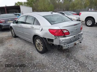 2009 Chrysler Sebring Touring with VIN 1C3LC56BX9N517563, listed as a IAAI auction lot 41853411 with 194,215 mi miles and . Bid and sale history available at DreamBid. Image 3.