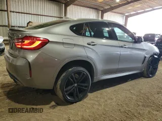 2019 BMW X6 M with VIN 5YMKW8C54KLR38377, listed as a Copart auction lot 84643024 with 47,556 mi miles and Salvage Title. Bid and sale history available at carsss.com. Image 3.