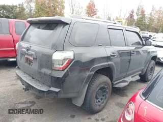 2021 Toyota 4Runner SR5 with VIN JTEMU5JR6M5855676, listed as a IAAI auction lot 41313015 with 101,078 mi miles and . Bid and sale history available at DreamBid. Image 4.