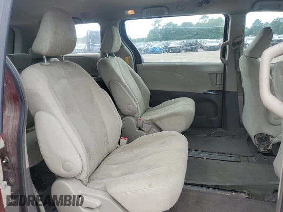 2014 Toyota Sienna L с VIN 5TDZK3DC8ES408192, выставлен на аукционе Copart как лот 60872055 с пробегом 149 177 миль миль и Чистый • Clean title. История ставок и продаж доступна на DreamBid. Изображение 11.