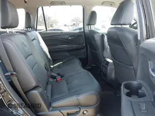 2020 Honda Pilot EX-L with VIN 5FNYF5H54LB009448, listed as a IAAI auction lot 41697106 with 63,310 mi miles. Bid and sale history available at carsss.com. Image 8.