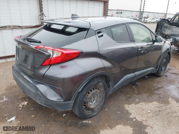 2020 Toyota C-HR LE with VIN JTNKHMBX0L1073916, listed as a IAAI auction lot 41720784 with 96,730 mi miles. Bid and sale history available at carsss.com. Image 4.