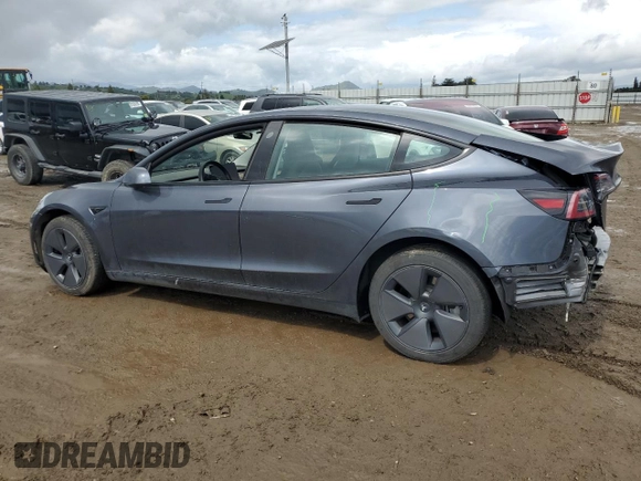 2023 Tesla Model 3 with VIN 5YJ3E1EA8PF677153, listed as a Copart auction lot 51065165 with 27,088 mi miles and Salvage Title. Bid and sale history available at carsss.com. Image 2.