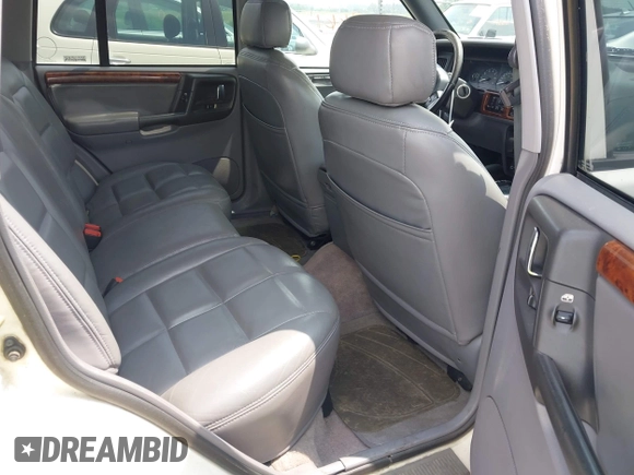 1996 Jeep Grand Cherokee Limited with VIN 1J4GZ78Y1TC381474, listed as a IAAI auction lot 42467661 with 155,587 mi miles and . Bid and sale history available at DreamBid. Image 8.